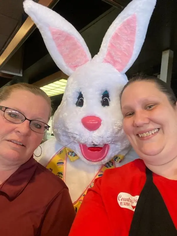 Easter bunny and two women