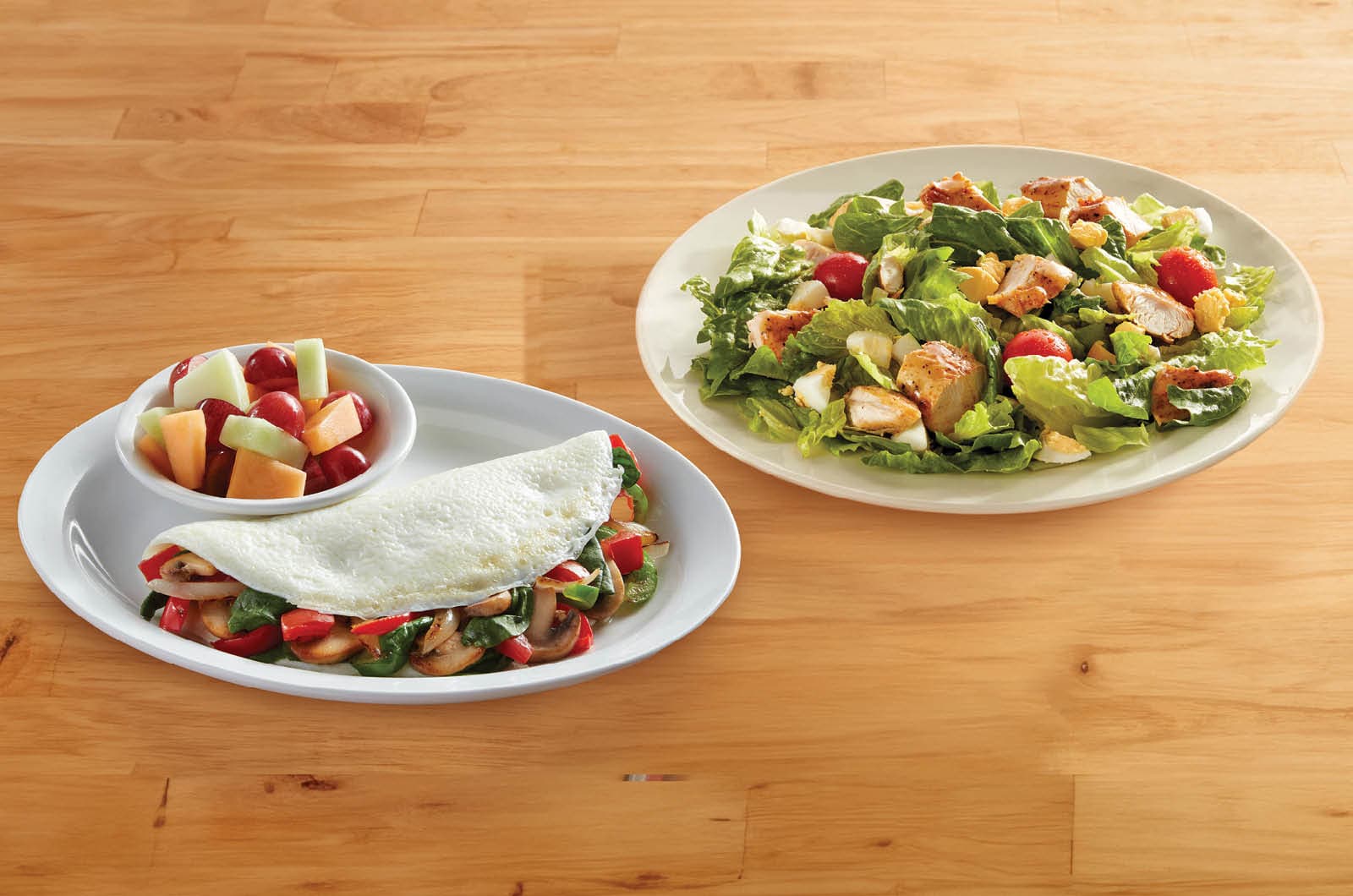 Two Dishes: Egg White Omelet and Salad.