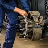 Mechanic changing brakes